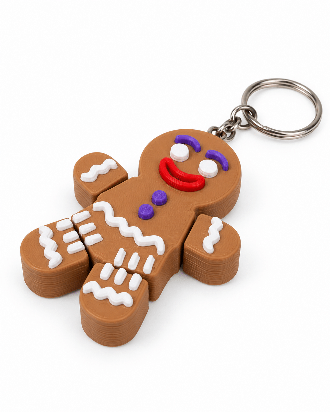 Porte-clé Mr Biscuit - vue de dessus ‣ Atelier 34 Porte-clé Mr Biscuit bonhomme pain d’épices imprimé en 3D, vue de dessus.