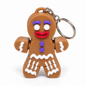 Porte-clé Mr Biscuit - vue principale ‣ Atelier 34 Porte-clé Mr Biscuit bonhomme pain d’épices imprimé en 3D, vue principale.